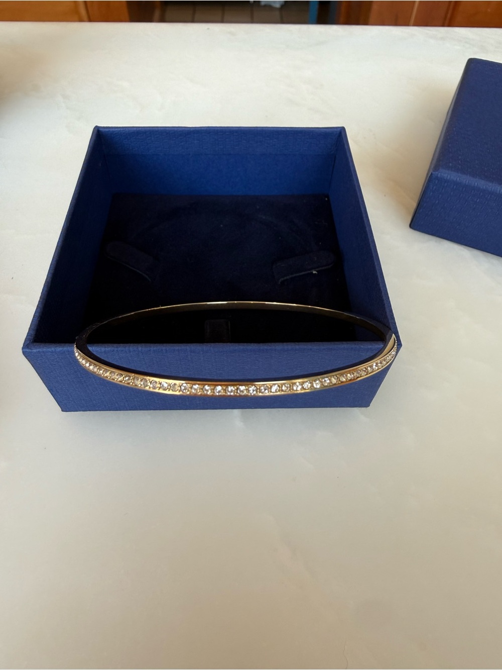 Swarovski Gold Tone Round Bangle Bracelet